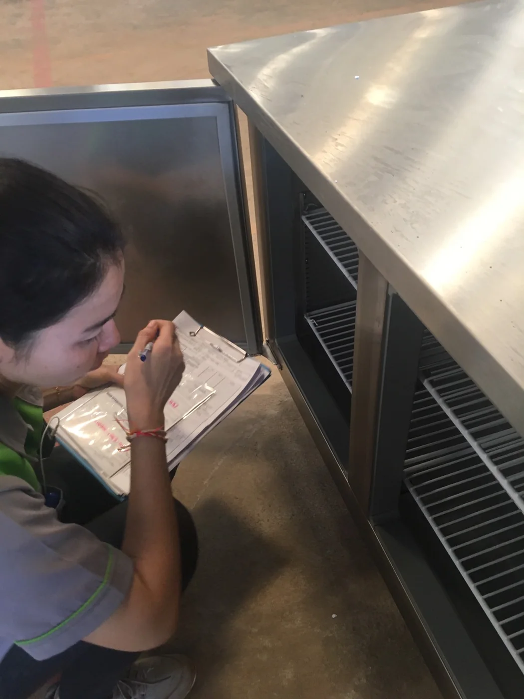 Checklist inspection of stainless refrigeration cabinet interior