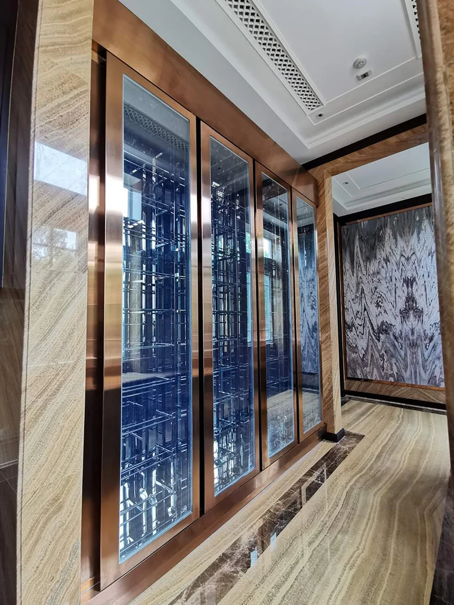 Glass-fronted wine cellar installation